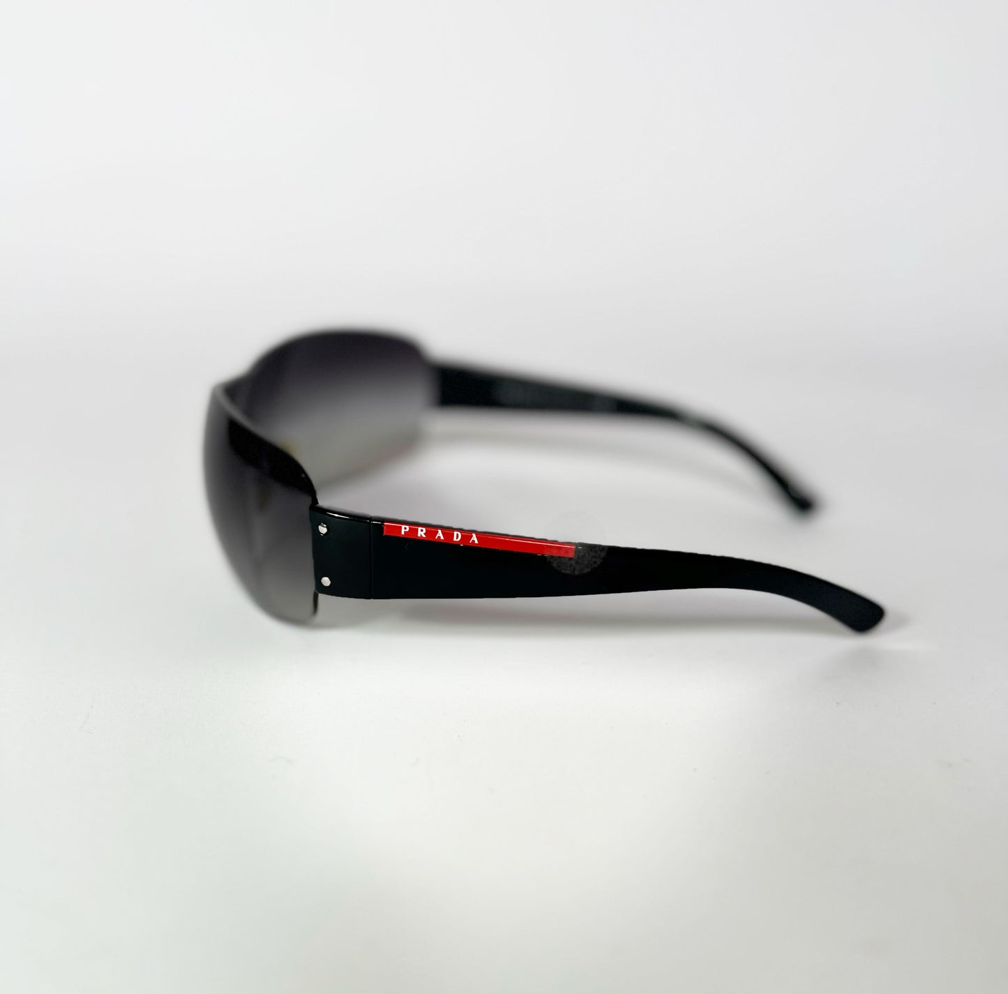 Vintage Prada Sport SPS07F Sunglasses with Black Gradient Tint