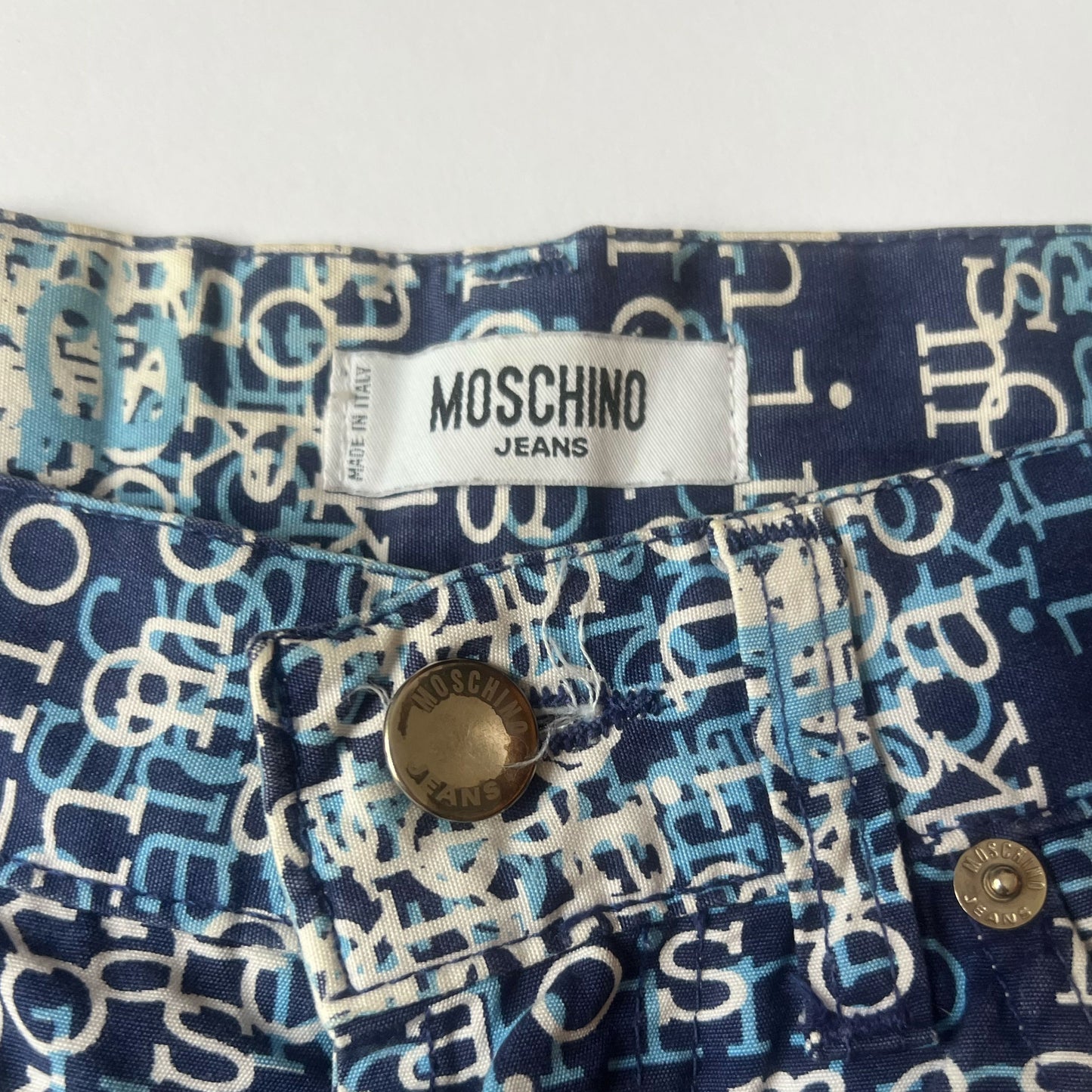 1999 Moschino Jeans Kaos Print Trousers in Blue - W29"